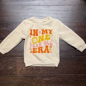 In my ONE Year Old Era long sleeve shirt size 12-18 month